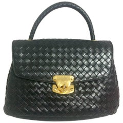 Vintage Bottega Veneta classic black lamb leather intrecciato handbag.