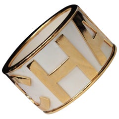 1990s Gilded metal and white enamel cuff bracelet