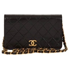 1990s Chanel Black Quilted Lambskin Vintage Mini Flap Bag