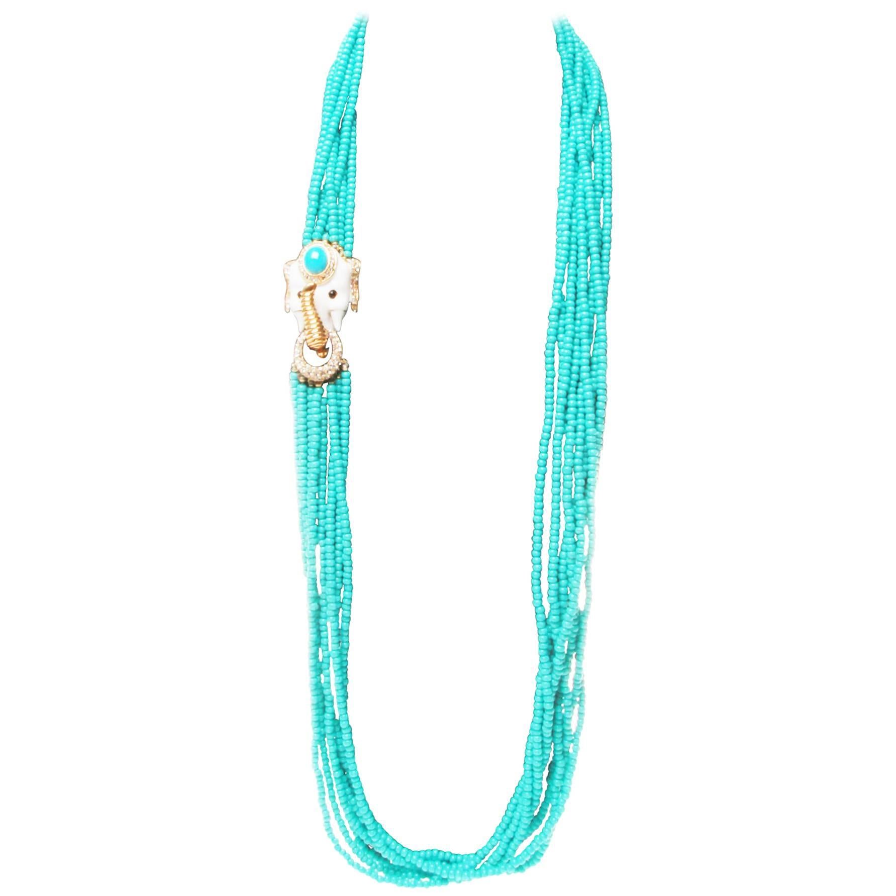 Ciner Turquoise Glass Torsade Necklace with Crystal White Enamel Elephant Clasp