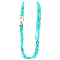 Ciner Turquoise Glass Torsade Necklace with Crystal White Enamel Elephant Clasp