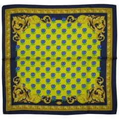 MINT. Retro Gianni Versace yellow, blue, green, gold, and flower motif scarf.