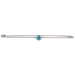 Aesthetic movement huge shawl pin with peacock feather coloured enamel "stone"