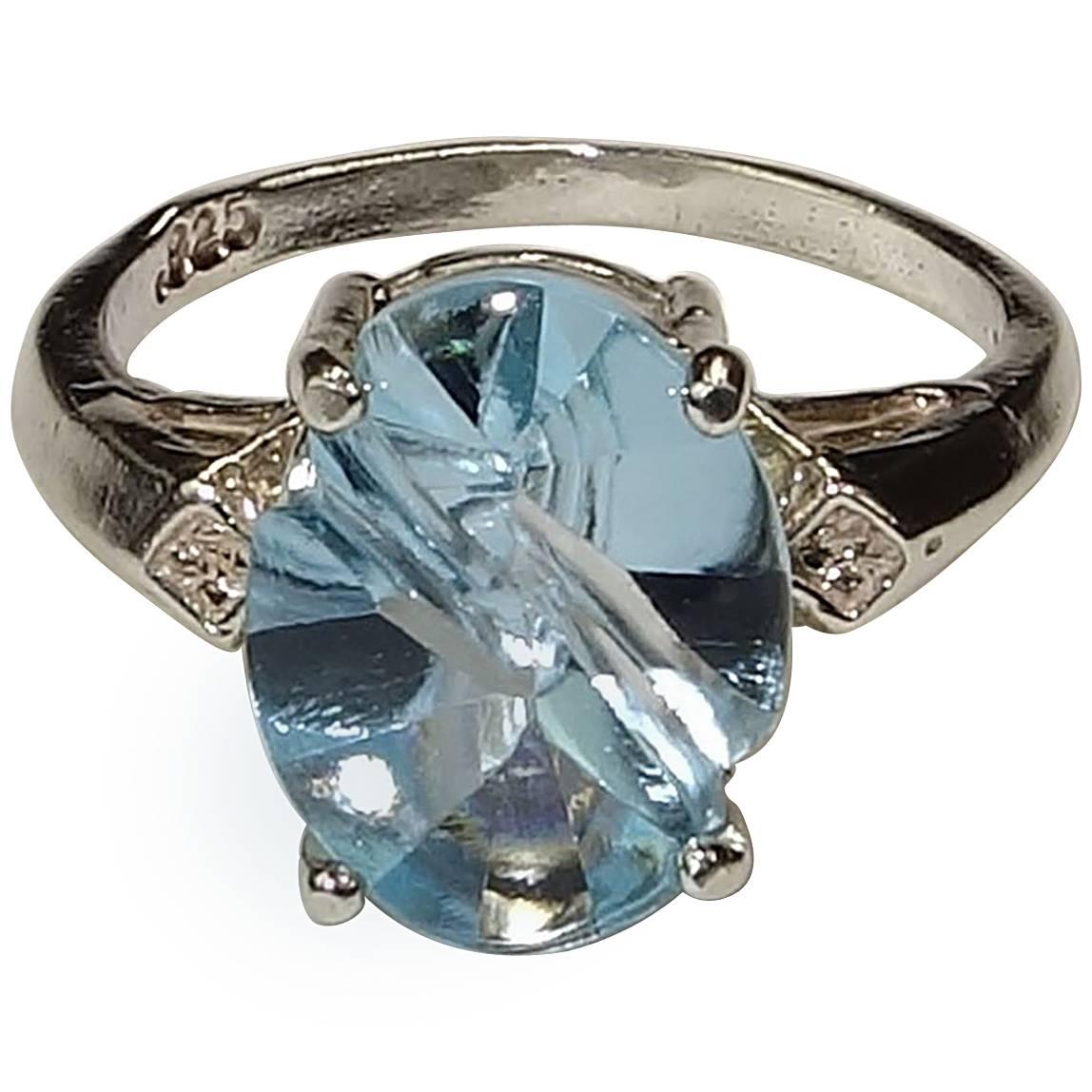 This is one of those beautiful, custom made, just perfectly sized oval blue topaz rings that longs to find a home on your finger. I love unique fantasy cuts and this is no exception. Topaz is November's birthstone.
Size 7.5
More from this seller by