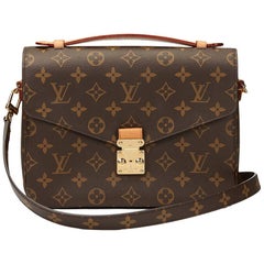 Used 2016 Louis Vuitton Brown Monogram Coated Canvas Pochette Metis