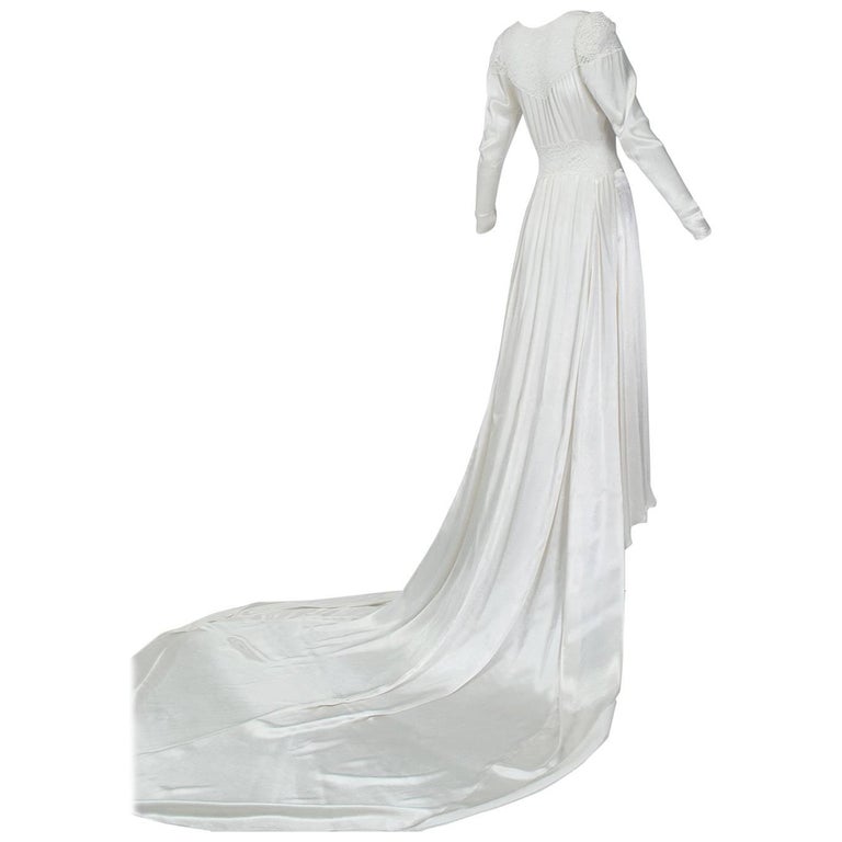 White Satin Hollywood Regency Wedding Gown With Cathedral Train