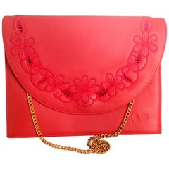 Vintage Valentino Garavani red clutch shoulder bag with flower embroidery deco.