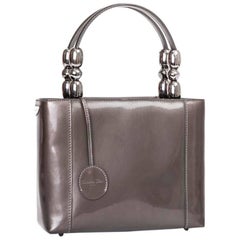 DIOR Sac à main 'Lady D' en cuir verni Brown