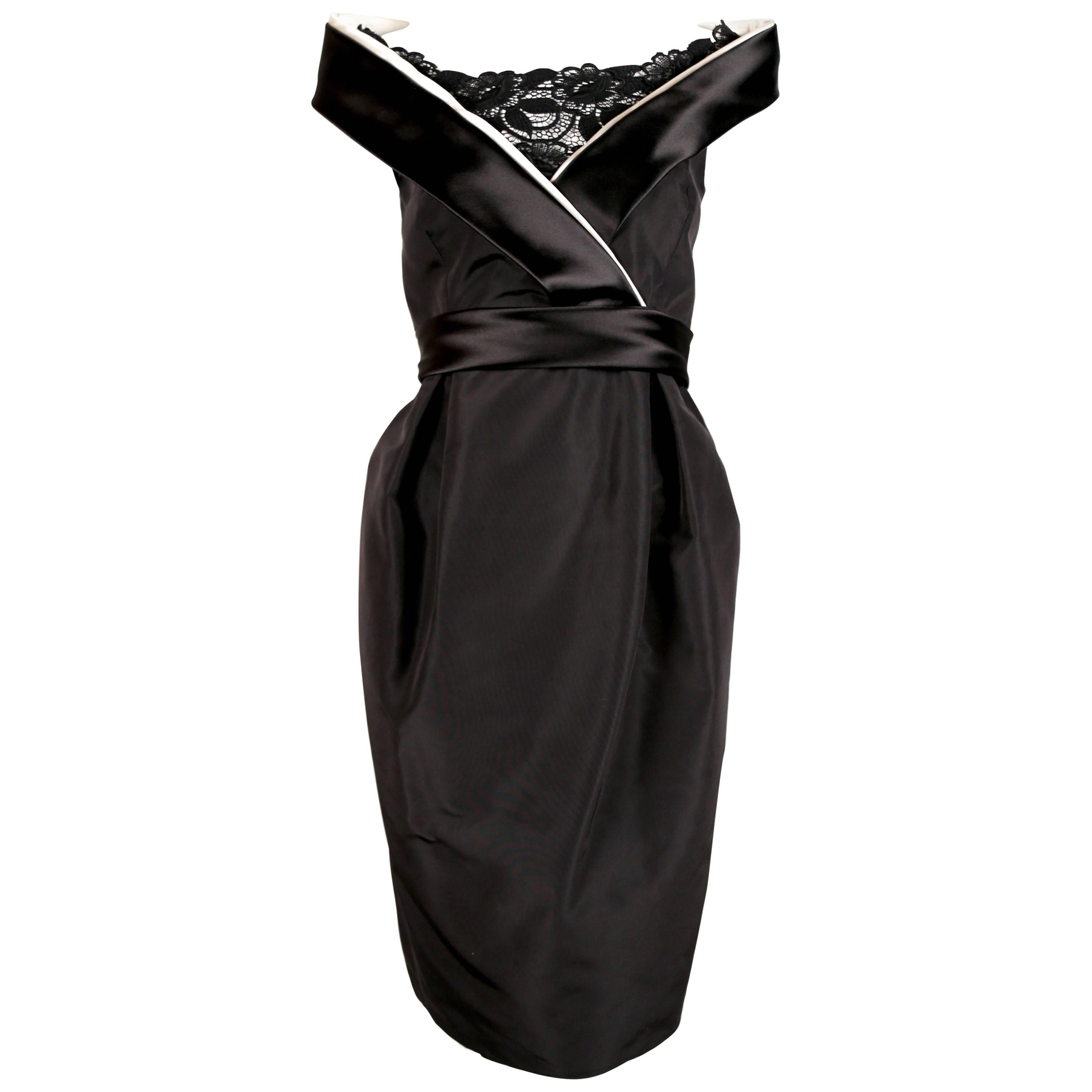 Alexander McQueen black satin dress with raised collar, 2006  