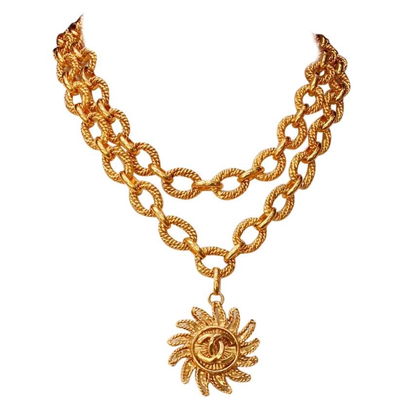Chanel short gilded metal necklace with sun-shaped pendant, 1994 Fall Collection