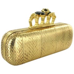 ALEXANDER Mc QUEEN Clutch in Gold Python