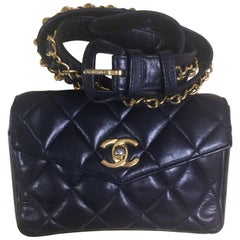 Vintage CHANEL black lamb waist bag, fanny pack with golden chain belt & CC.