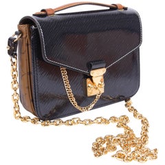 Louis Vuitton Pochette Metis Shiny Epi Leather with Reverse Monogram Canvas  Mini - ShopStyle Shoulder Bags