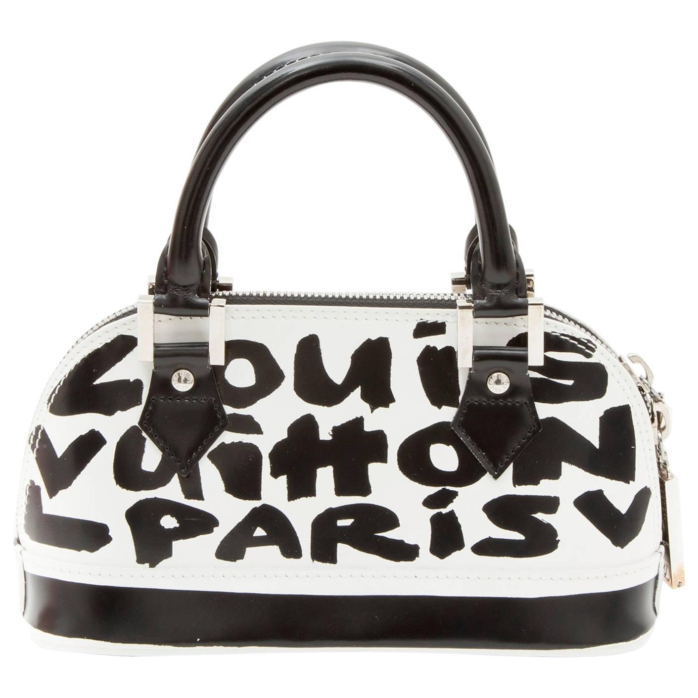 black louis vuitton bag with white letters