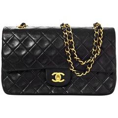 Chanel 
90s Vintage Black Lambskin Quilted Medium 10" Double Flap Classic Bag