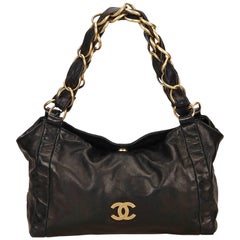 Chanel Schwarz Leder Fold Top Gold Chain Strap Tote Bag