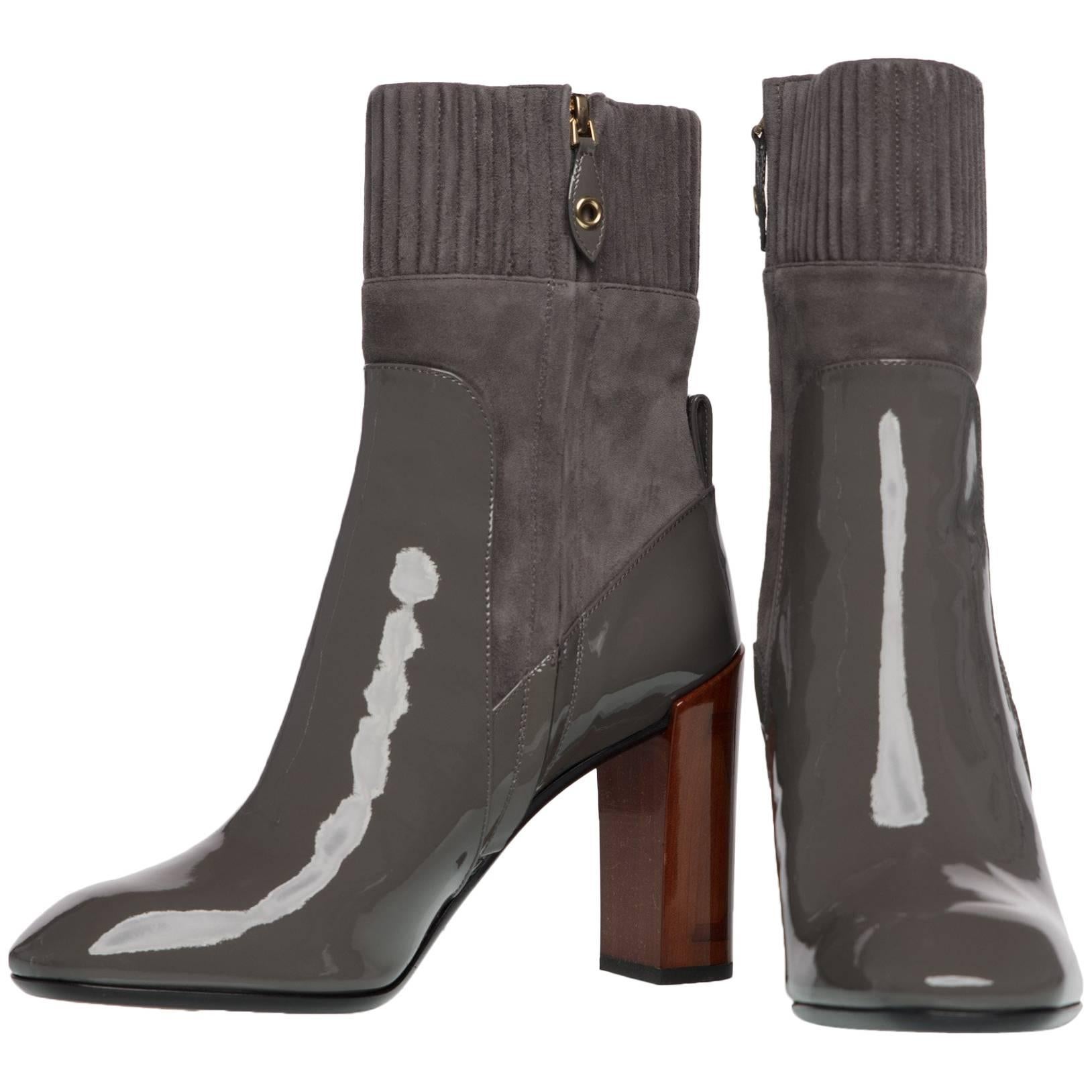 For the last 160 years Louis Vuitton Malletier has been honing its skills in fine leather goods. Originally focused on beautifully articulated travel trunks, this French fashion brand epitomizes luxury. These sleek boots are designed with full