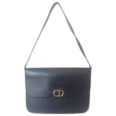 Vintage Christian Dior black leather shoulder bag, clutch bag with golden CD