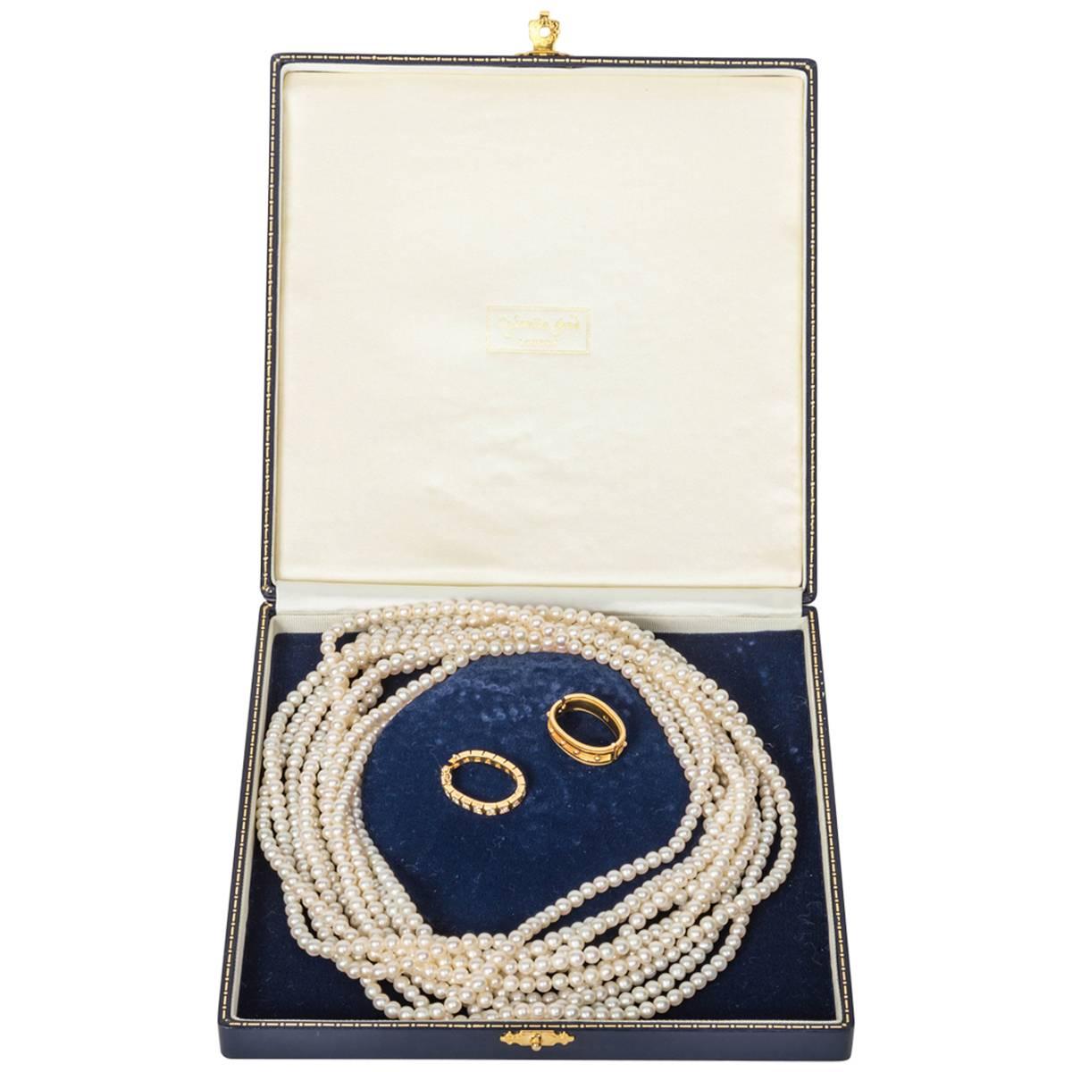 Five long ropes of pearls in Cassandra Goad presentation box.
Each strand measures 33 inches in total with a drop of 16.5 inches.
These lustrous pearls can be doubled using the beautiful pearl shorteners, one in gold with diamonds, the other in