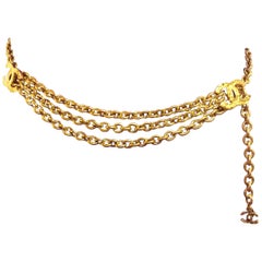 MINT. Vintage CHANEL golden chain belt with triple layer chains and 3 CC marks