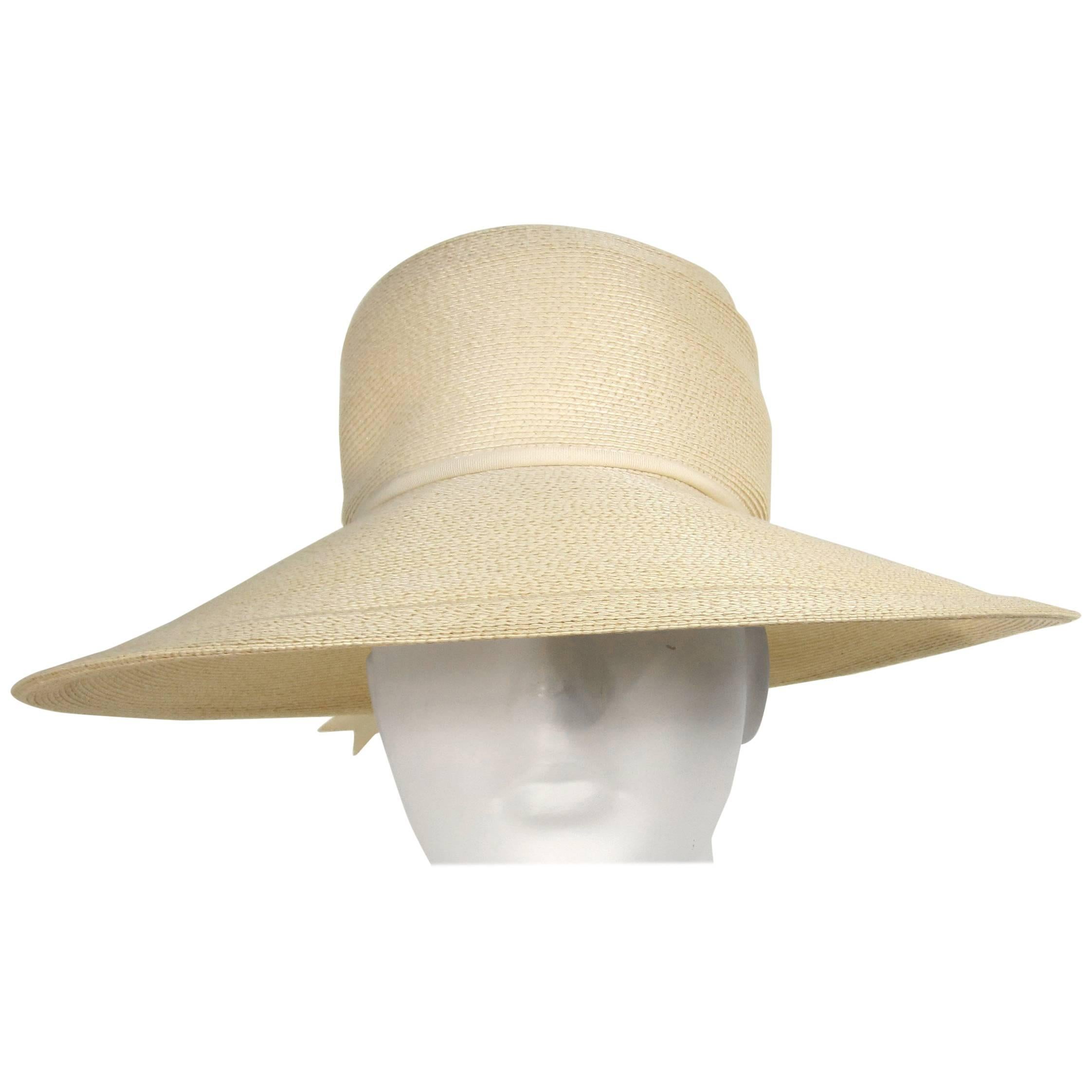 Stunning Over-sized Mr. John Vintage Beach Hat. Measuring 22.75 - 4.75 inch wide brim 4 inches high. This is out of a massive collection of Contemporary designer & Vintage clothing as well as Hopi, Zuni, Navajo, Southwestern, sterling silver,