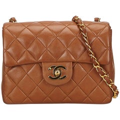 Vintage Chanel Brown Mini Matelasse Quilted Lambskin Leather flap shoulder bag