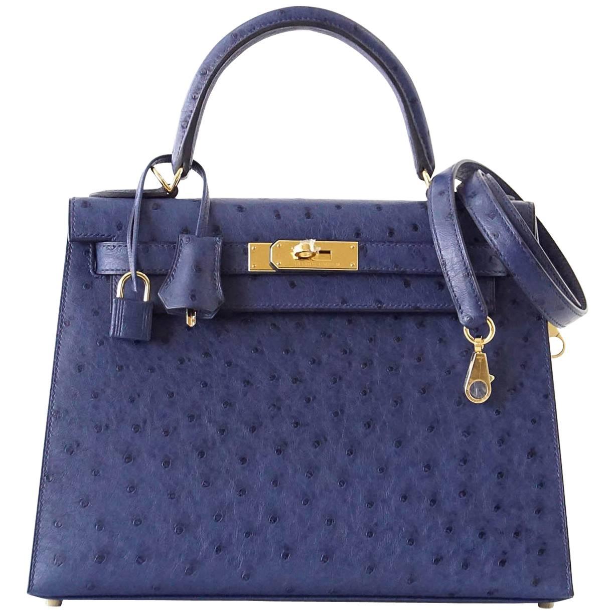 A BLEU MYKONOS OSTRICH SELLIER KELLY 28 WITH GOLD HARDWARE