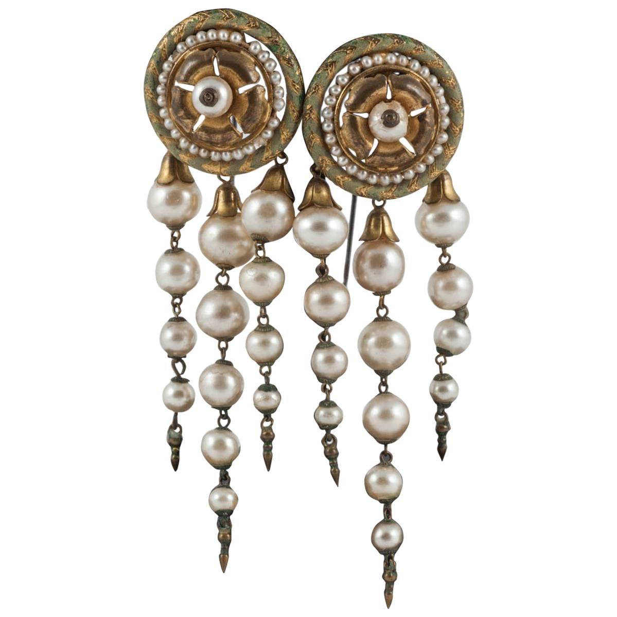 A pair of handblown glass pearl and enamelled gilt hat pins, 19th Century