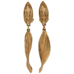 Christian Dior Textured gilt metal "leaf" drop clip on earrings, 1960s 