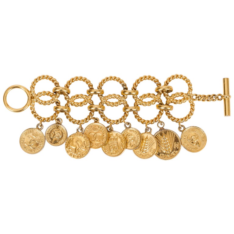 Chanel 1980's Rare Gold Tone Double Coin Charm Bracelet For Sale at 1stDibs