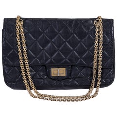 Chanel Schwarze Reissue Gold Jumbo Tasche mit Klappe