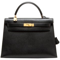 Sellette HERMES "Kelly 32" en cuir de vachette des Ardennes noir avec surpiqûres