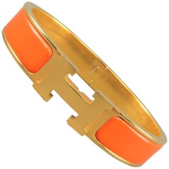 HERMES Bracelet - Bijoux plaqué or 18 carats:: émail orange:: Clic H Bangle Jewelry