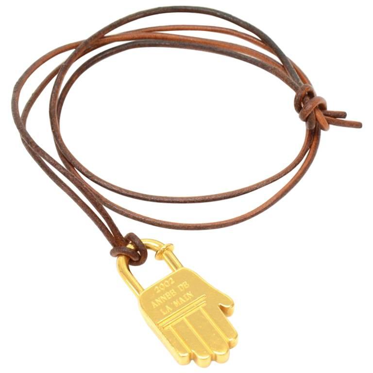 Hermes Gold Tone Hand Motif Cadena Pendant String Necklace For Sale
