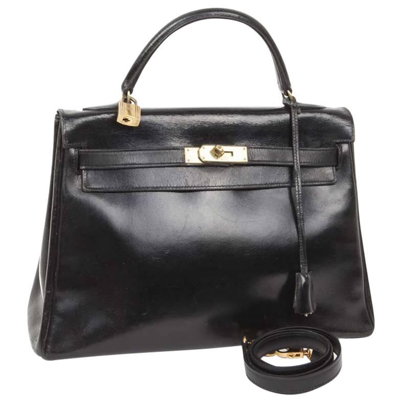 HERMES Vintage Kelly 32 Bag in Black Box Leather with its Strap