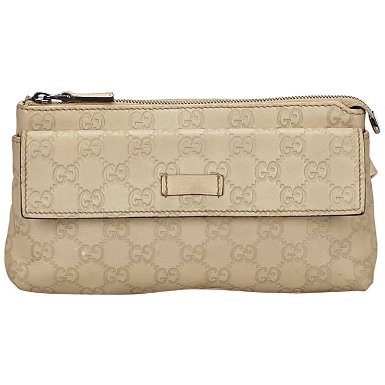 Gucci Beige Embossed Guccissima Belt Bag For Sale at 1stdibs