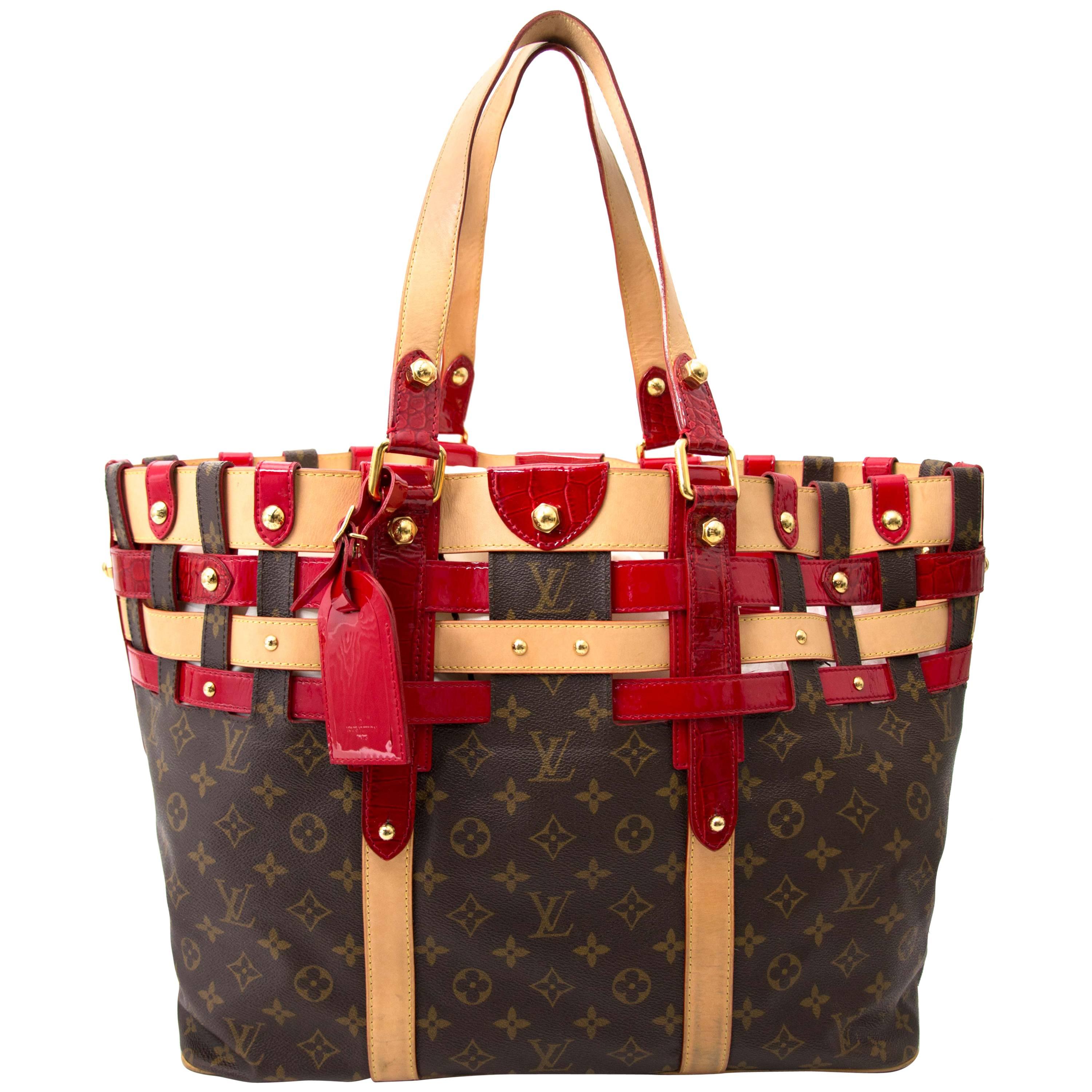 Bags by Louis Vuitton: Ruby Tube Handbag by Louis Vuitton