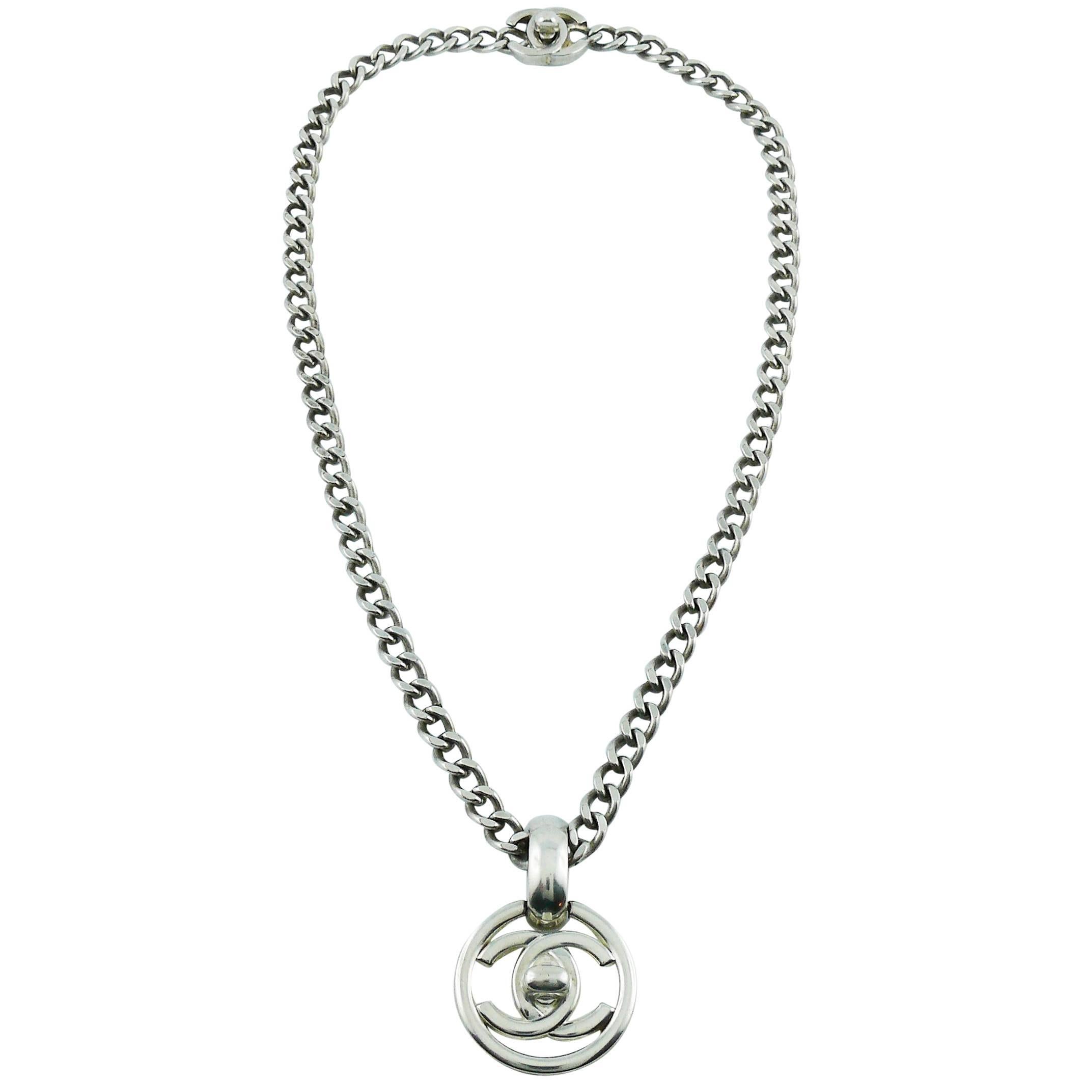 Chanel Vintage 1997 Silver Toned Turn-Lock Pendant Necklace at 1stDibs