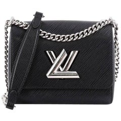 Louis Vuitton Twist Handbag Epi Leather PM