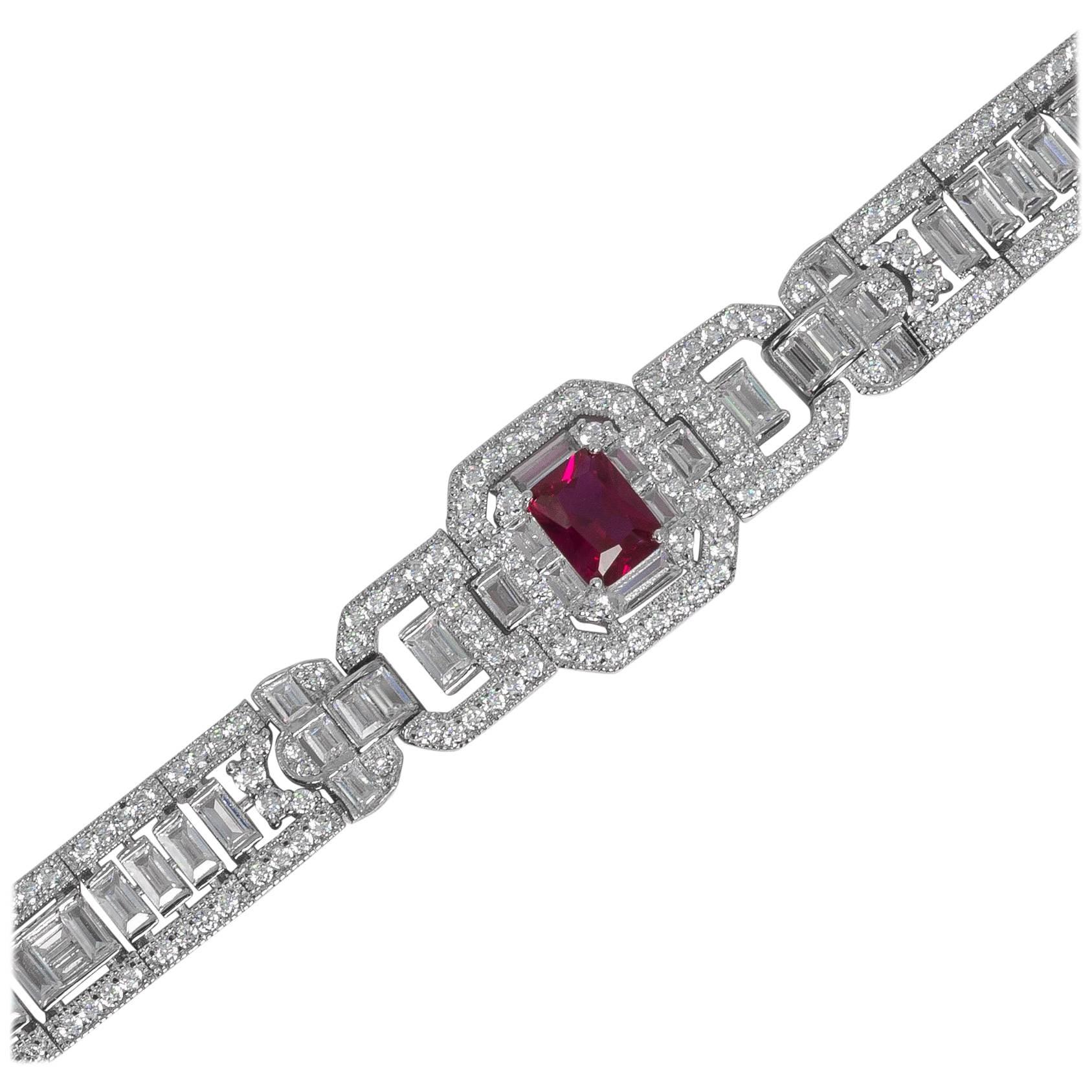 Art Deco style diamond ruby costume jewelry  bracelet hand made and hand cut cubic zirconia hand set in non  tarnish rhodium sterling silver. Baguettes running through the center edged with round stones all flexible center set art deco motif with 3
