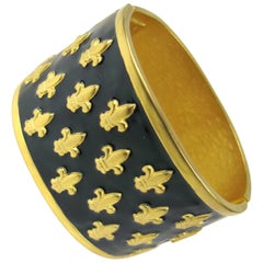 Karl Lagerfeld Enamel-Gold Tone fleur de lis Massive Never worn bracelet 1990s