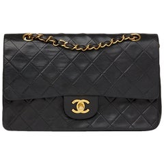 1990s Chanel Black Quilted Lambskin Vintage Medium Classic Double Flap Bag 1990s Chanel Black Quilted Lambskin Vintage Medium Classic Double Flap Bag