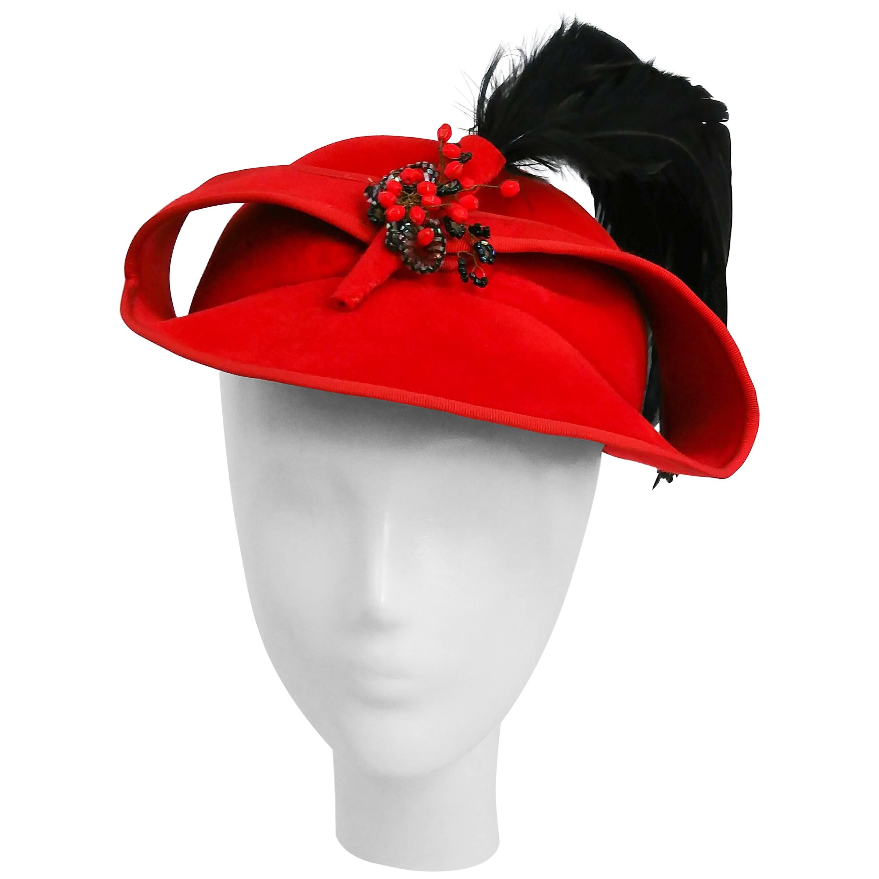 1930s Red Sculptural Velvet Hat with Black Feather For Sale