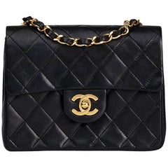 1989 Chanel Black Quilted Lambskin Vintage Mini Flap Bag 