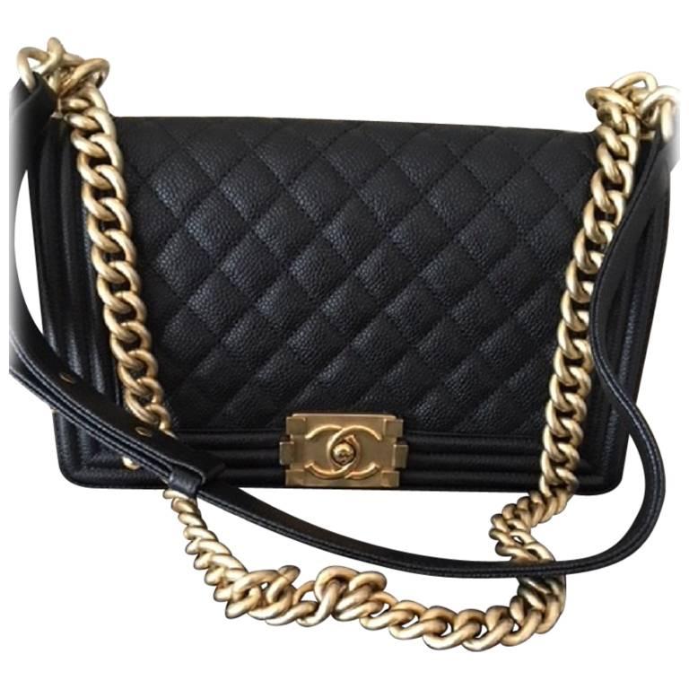 Chanel Medium Boy Bag in Quilted Caviar Leather.  For Sale