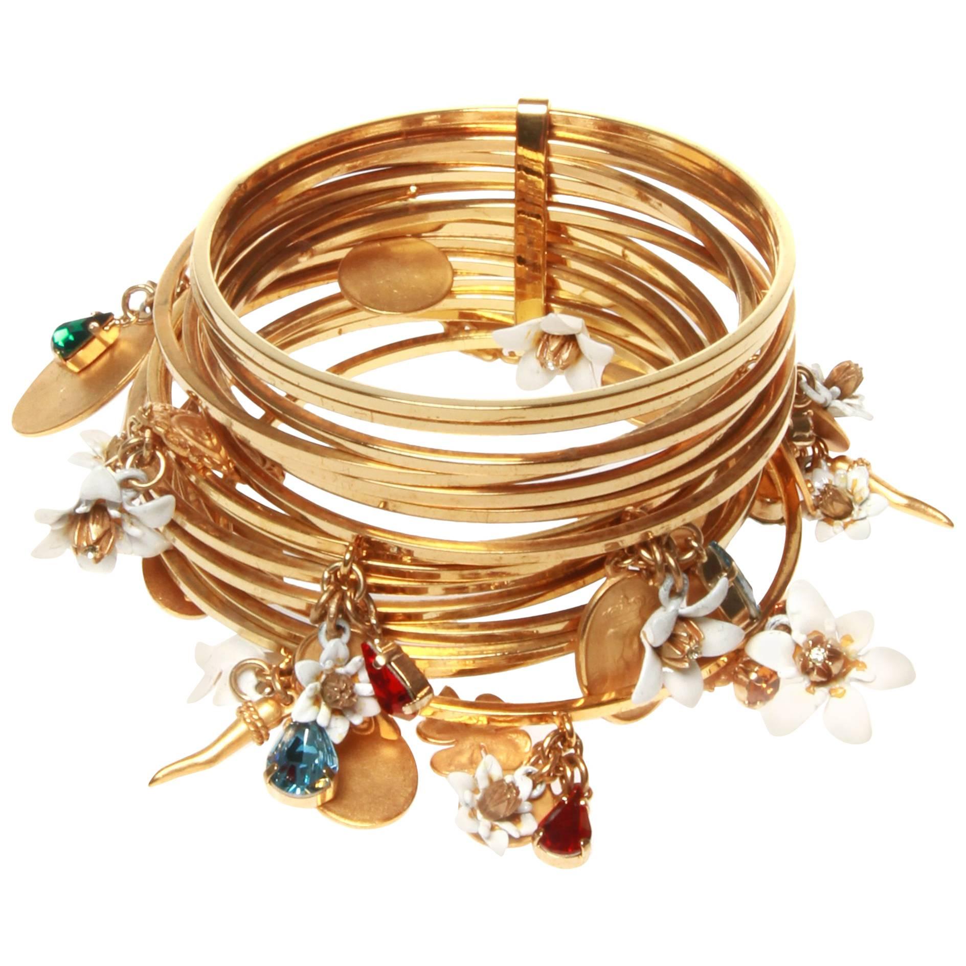 Dolce and Gabbana Gold Stacked Charm Cuff Bracelet  For Sale