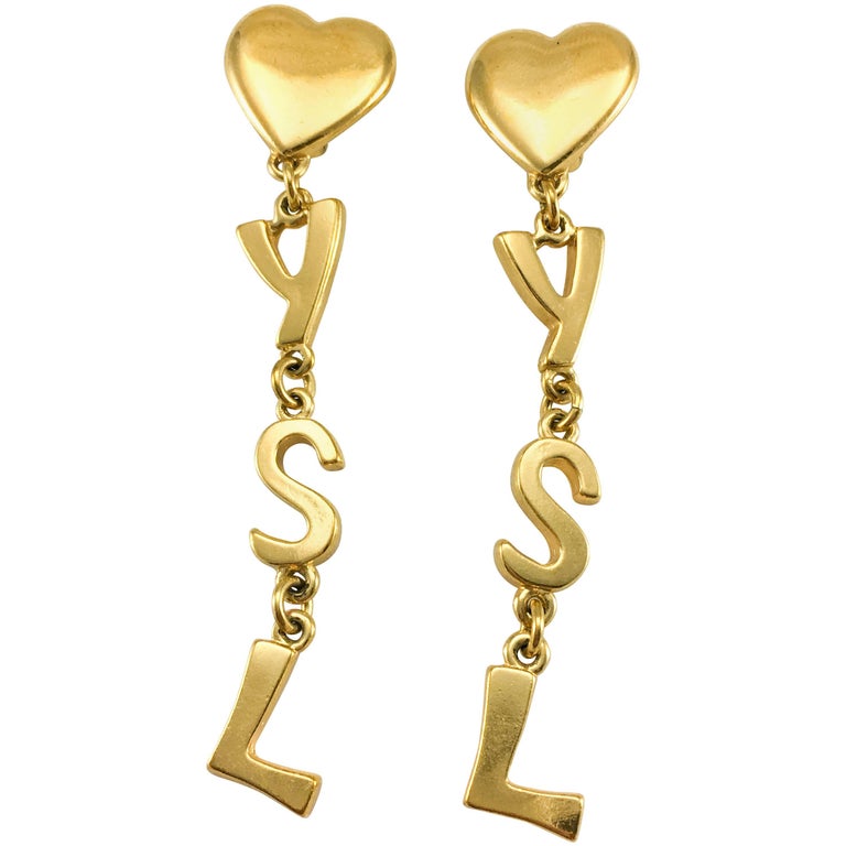 Yves Saint Laurent Long GoldPlated YSL Dangling Earrings, 1980s at