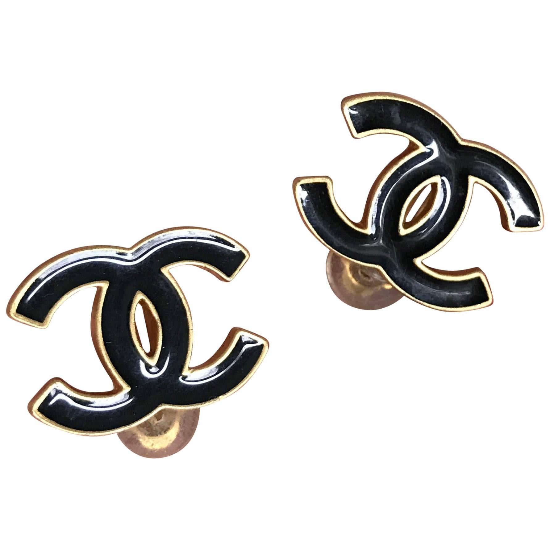 Chanel black enamel and matte gold CC logo clip earrings