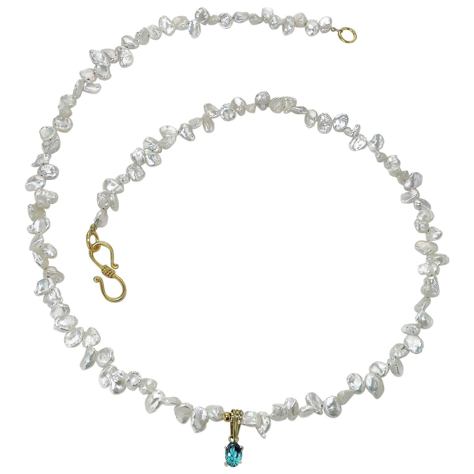 Freshwater Pearl necklace with a lovely focal of sparking Indicolite Brazilian Tourmaline set in 18kt yellow gold. Vermeil S clasp. Perfect for the June or October birthday present, or any other time.... Pearl in the traditional June birthstone.