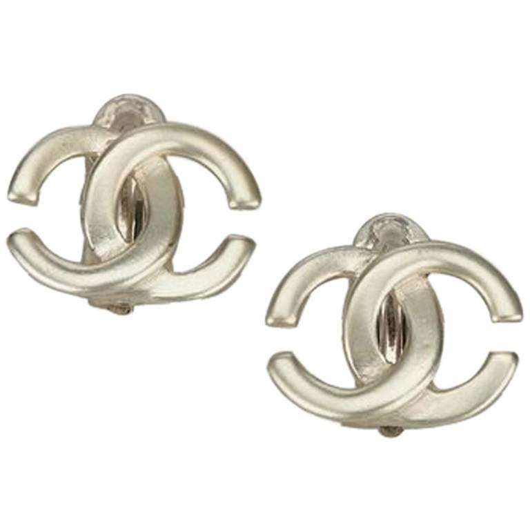 Chanel Silver Logo Clip-On Earrings